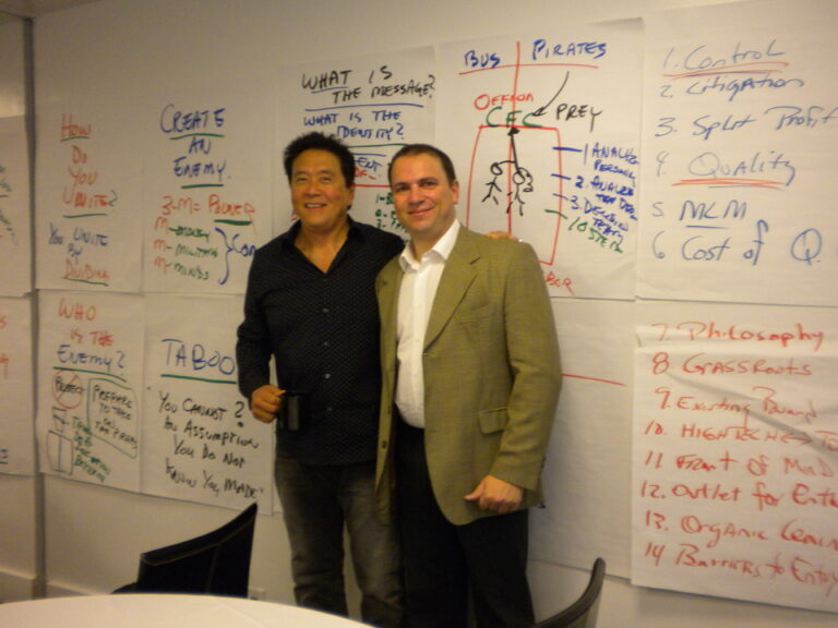 cristian abratte y robert kiyosaki en clases de finanzas