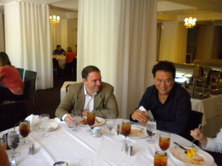 cristian abratte y robert kiyosaki cenando
